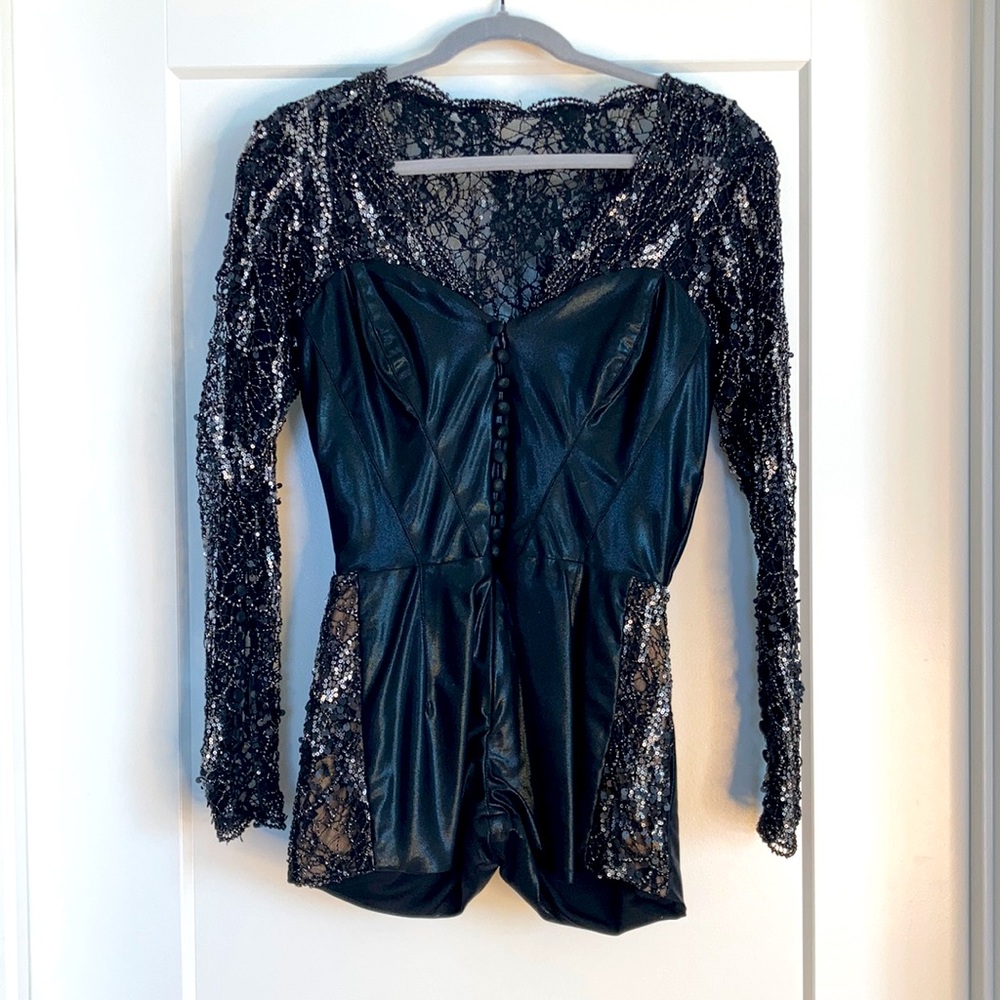 Black Leather long Sleeve Romper with Silver Sequence. Size M.